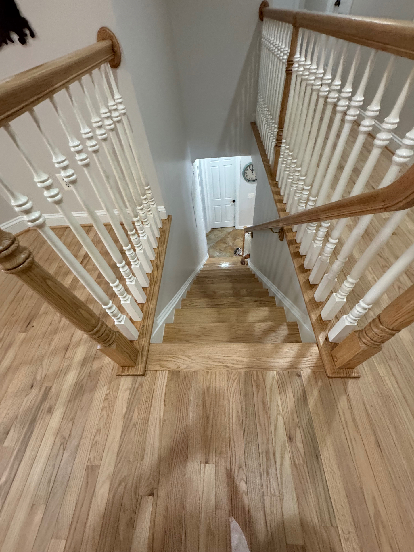 Craftsman refinishing a hardwood floor